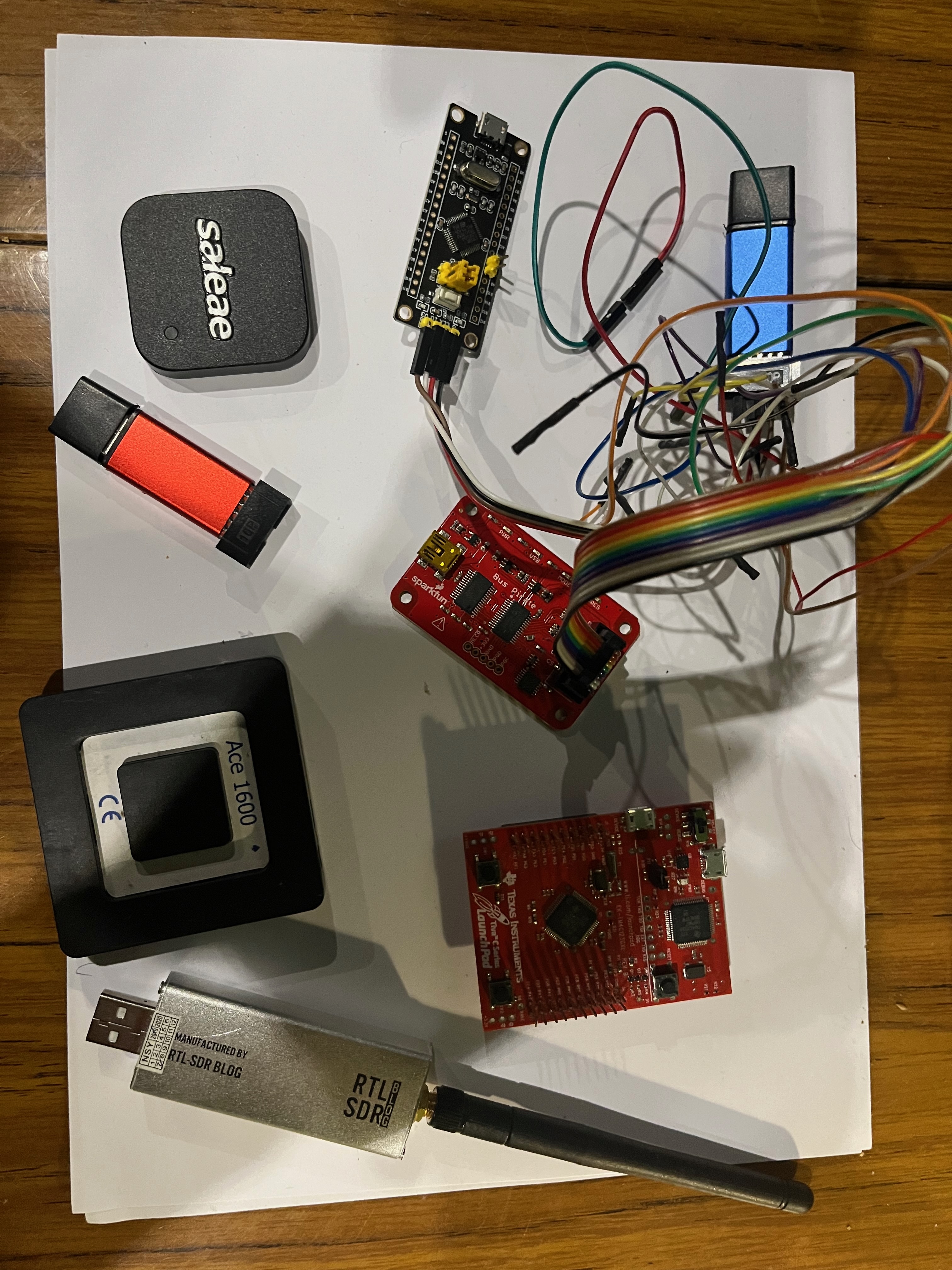 9 hardware pentest tools on a white surface